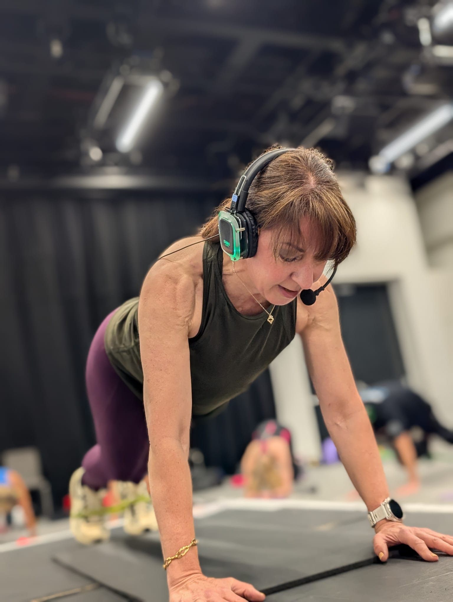 Athleticum Fitness Presenter - Cat Booker teaching at PROS Fitness Conference in the UK